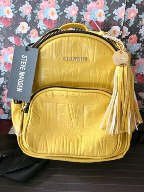 Steve Madden Yellow Embossed Mini Backpack with Tassel Charm